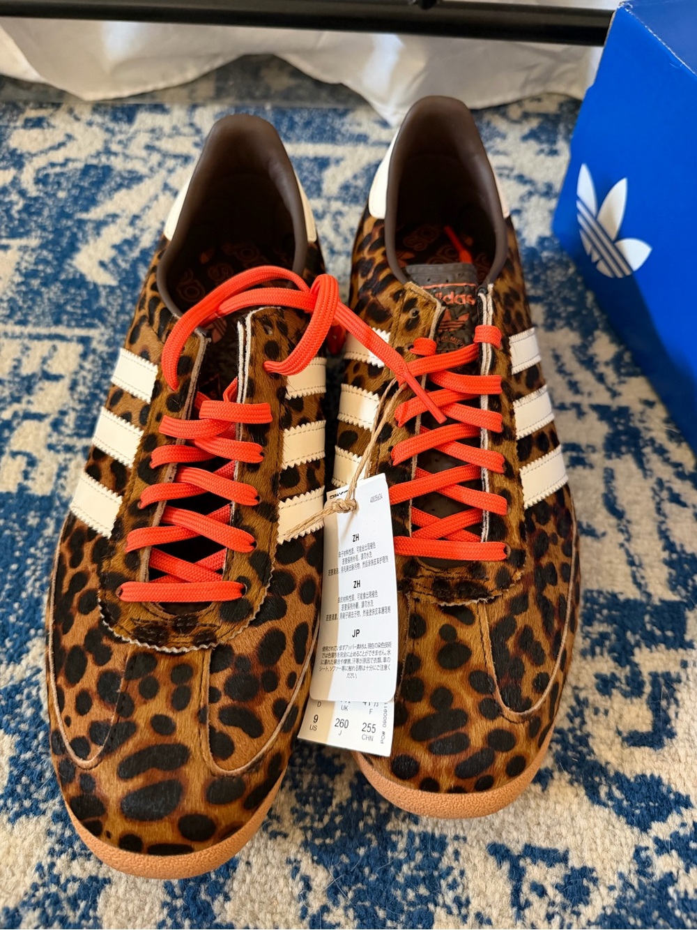 adidas Women's Leopard Print Sneakers with White Stripes and Orange Laces